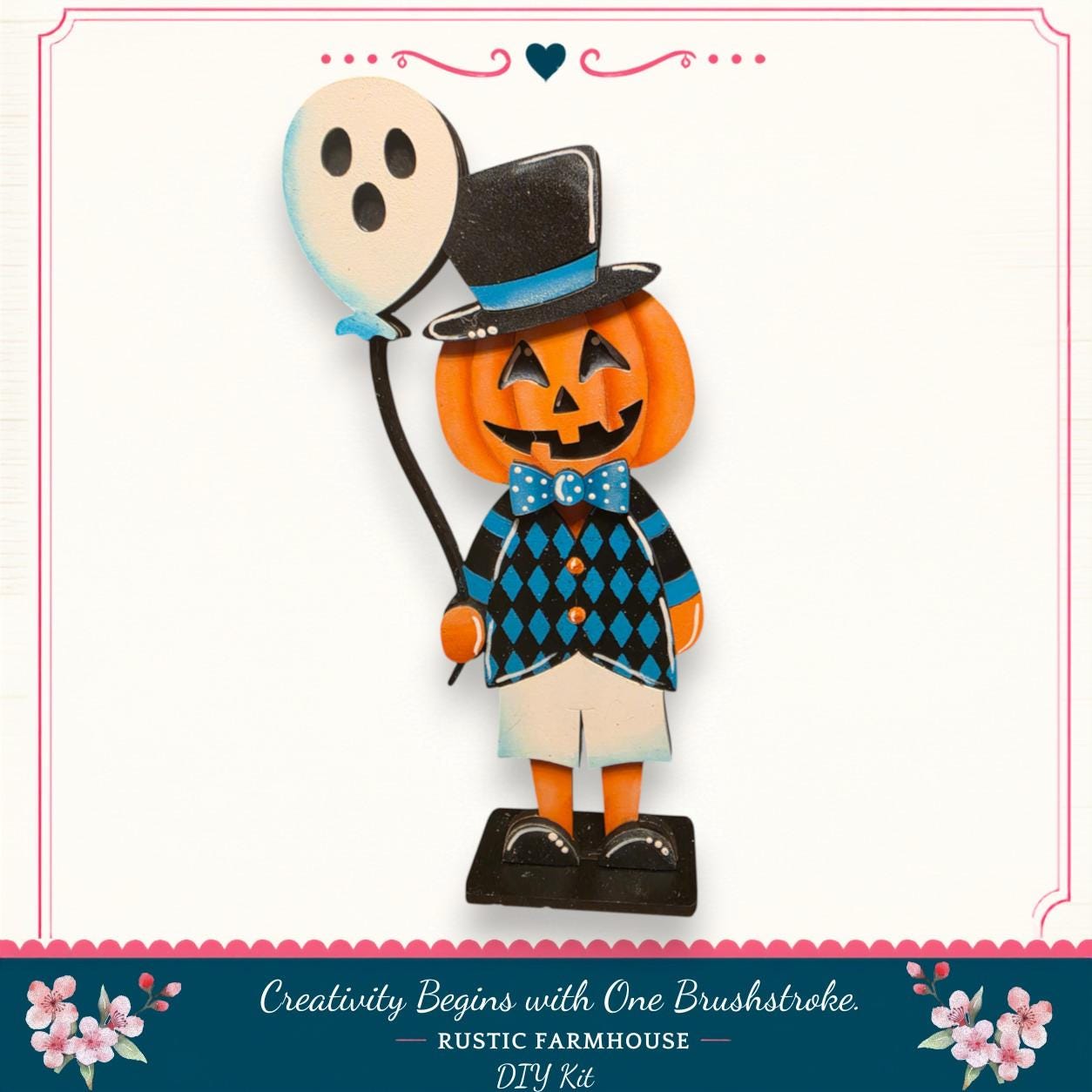 A wooden pumpkin figure wearing a top hat and holding a balloon with a ghost on it, set against a white background.