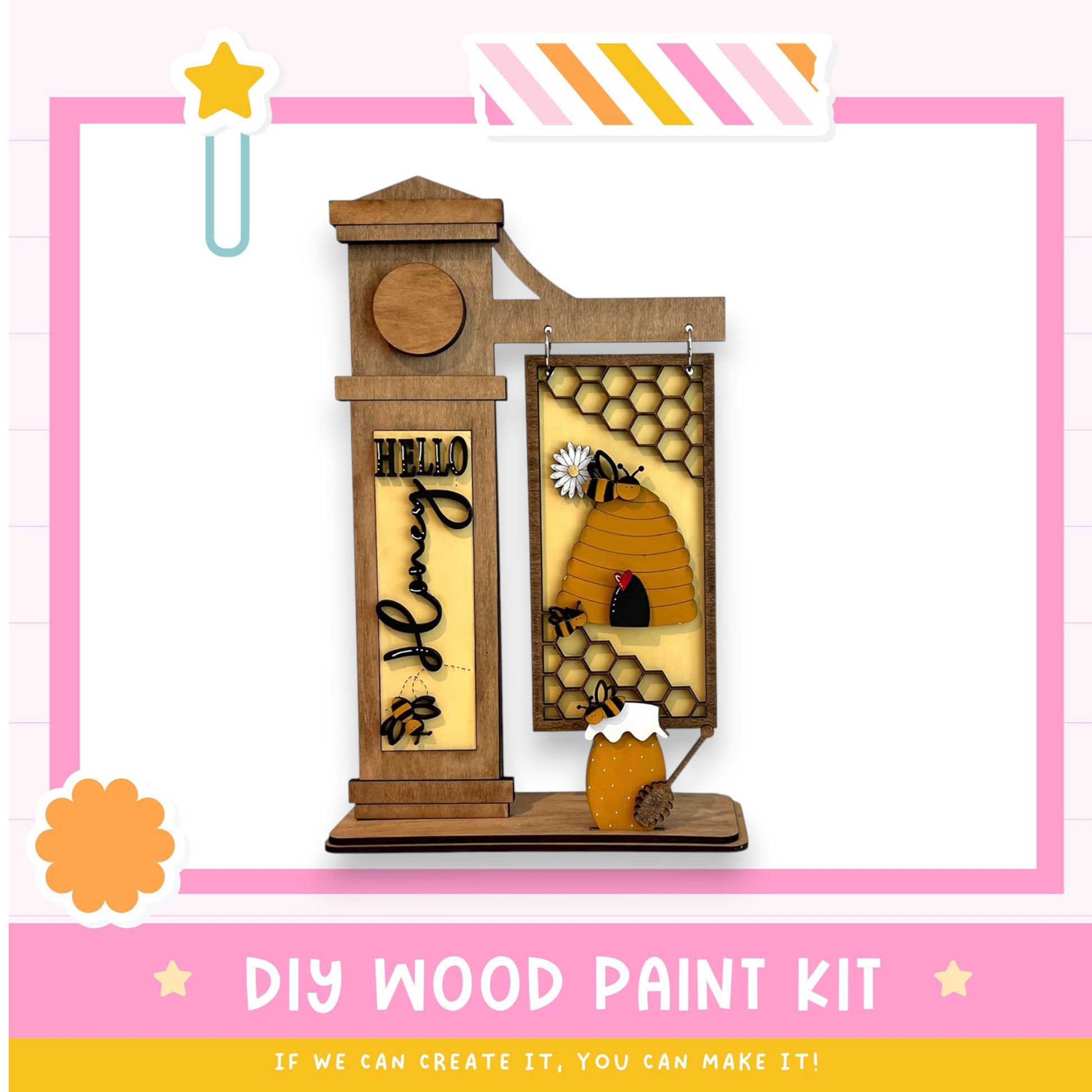 a picture of a wooden paint kit with a picture of a beehive