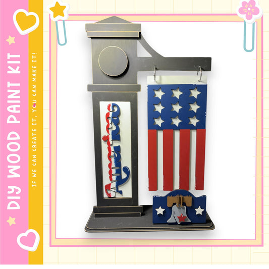 a DIY paint kit kit, which includes a wooden frame with an American flag design and a wooden plaque. The kit appears to be made of wood and is designed for creating a wooden frame with a painted American flag design.