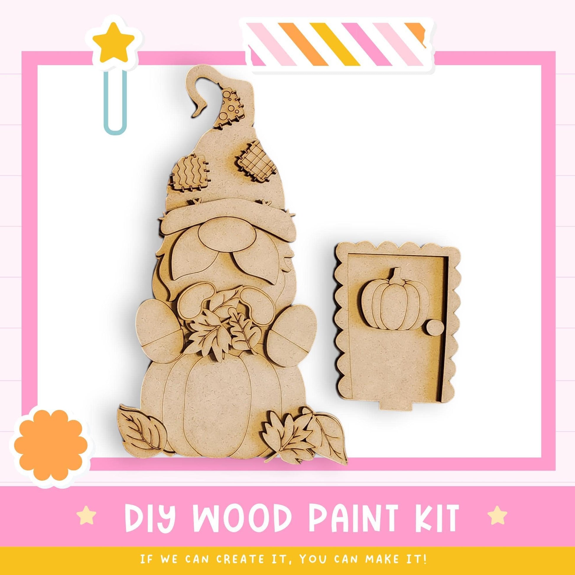 a DIY wood paint kit for creating wooden gnome or gnome-like figures. The kit includes a wooden gnome figure and a wooden door, both of which are decorated with leaves and a pumpkin. The kit is presented in a pink and white frame, and the text "DIY WOOD PAINT KIT" is displayed prominently.