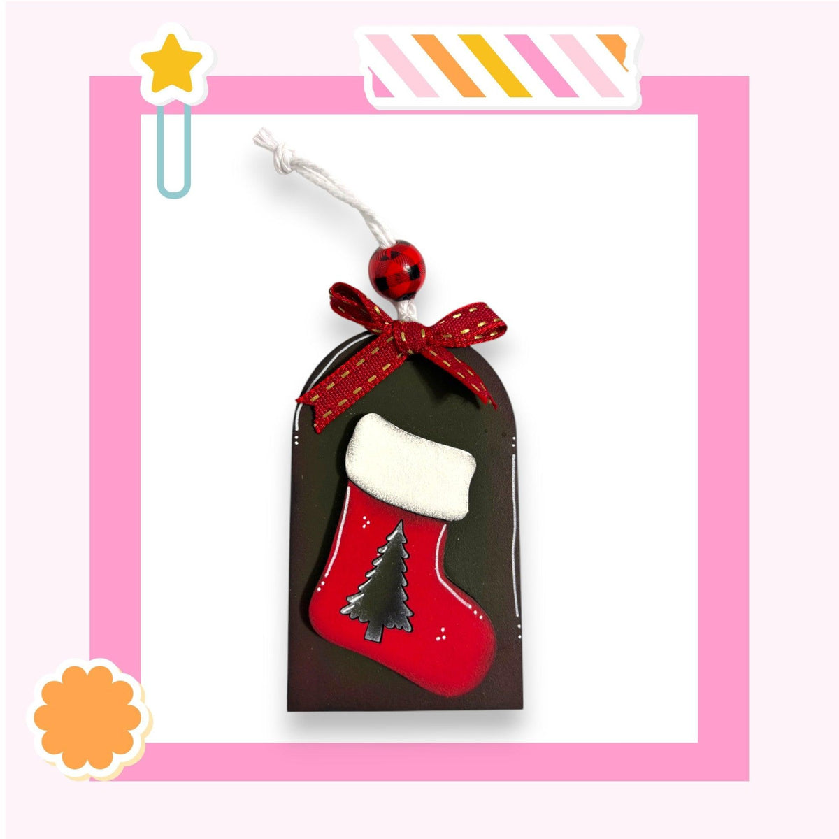 a christmas stocking ornament with a red stocking