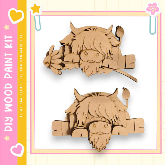 two wooden cutouts of a bison or buffalo, one standing and one lying down, with a pink and yellow border.