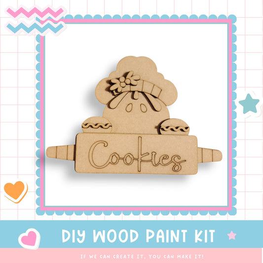 a wooden cookie kit with the words cookies on it