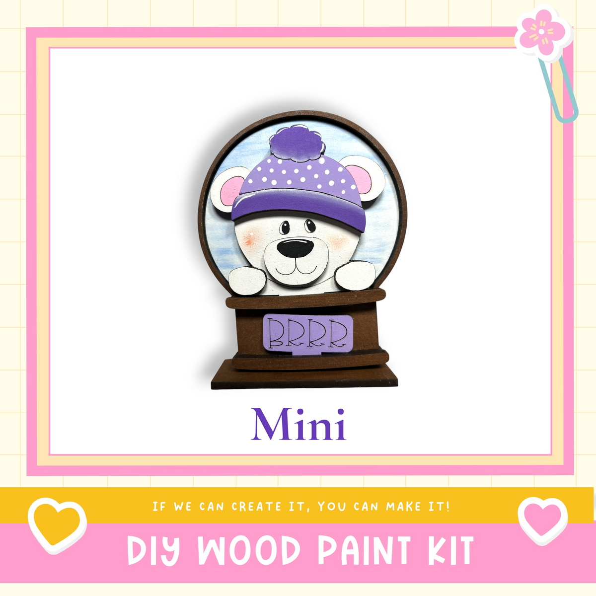 a wooden snow globe with a teddy bear inside, and it is labeled as a "Mini" snow globe.