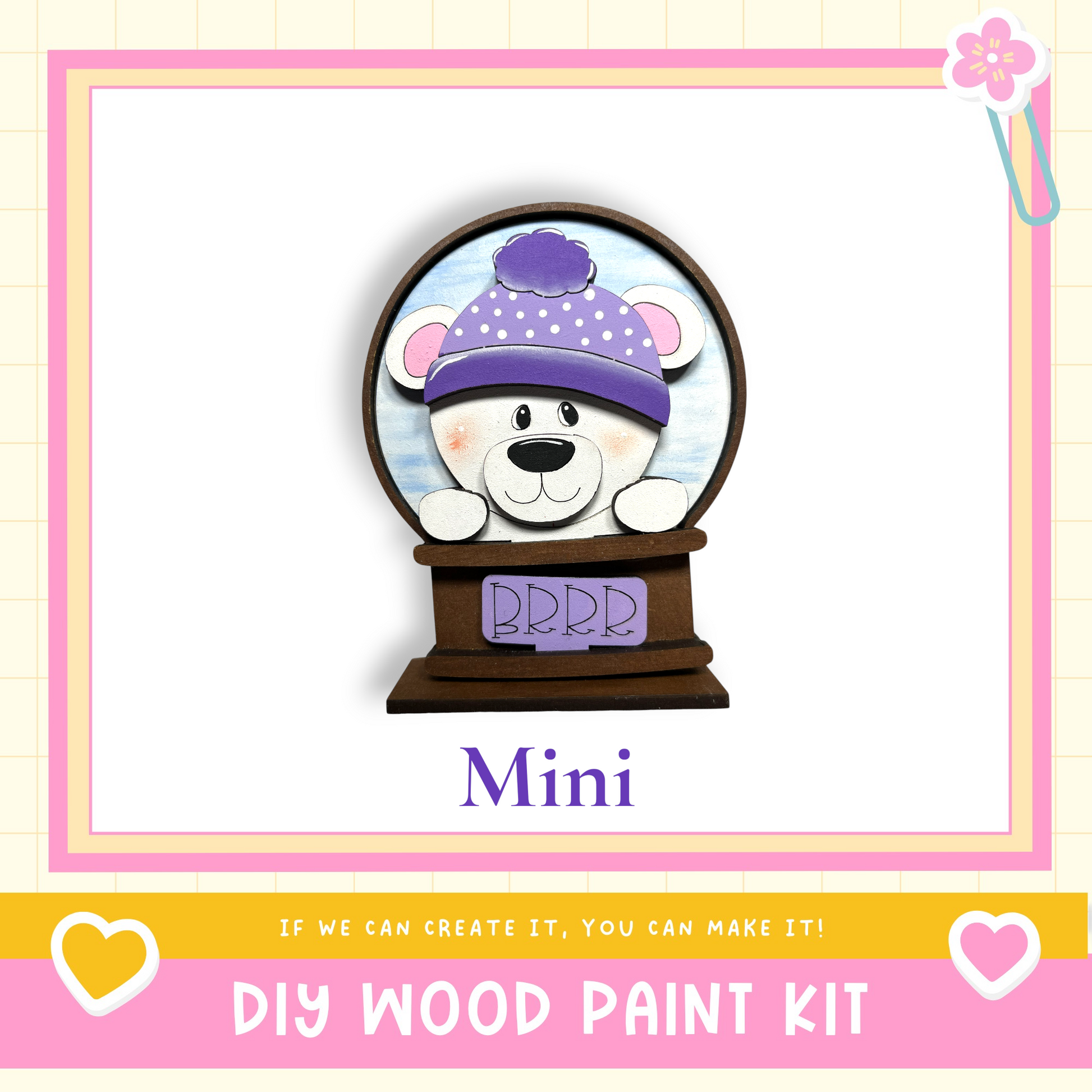 a wooden snow globe with a teddy bear inside, and it is labeled as a "Mini" snow globe.
