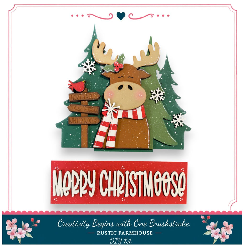 A festive Christmas-themed collage featuring a cartoon moose wearing a scarf and surrounded by snowflakes, pine trees, and directional signs.