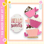 The image is a colorful and playful collage featuring various decorative elements, including heart-shaped cutouts, cupcake-shaped cutouts, and the text "Hello sweets" in a playful font.