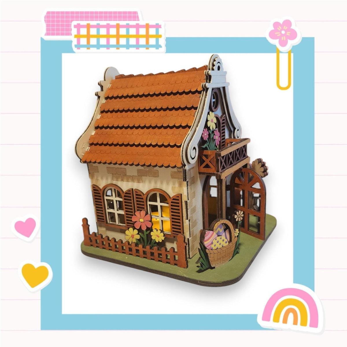 a small wooden house with a red roof