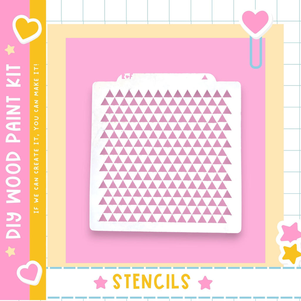 a DIY wood paint kit with a pink background and a white stencil with a pattern of pink triangles.