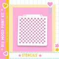 a white stencil with a checkered pattern on a pink background.
