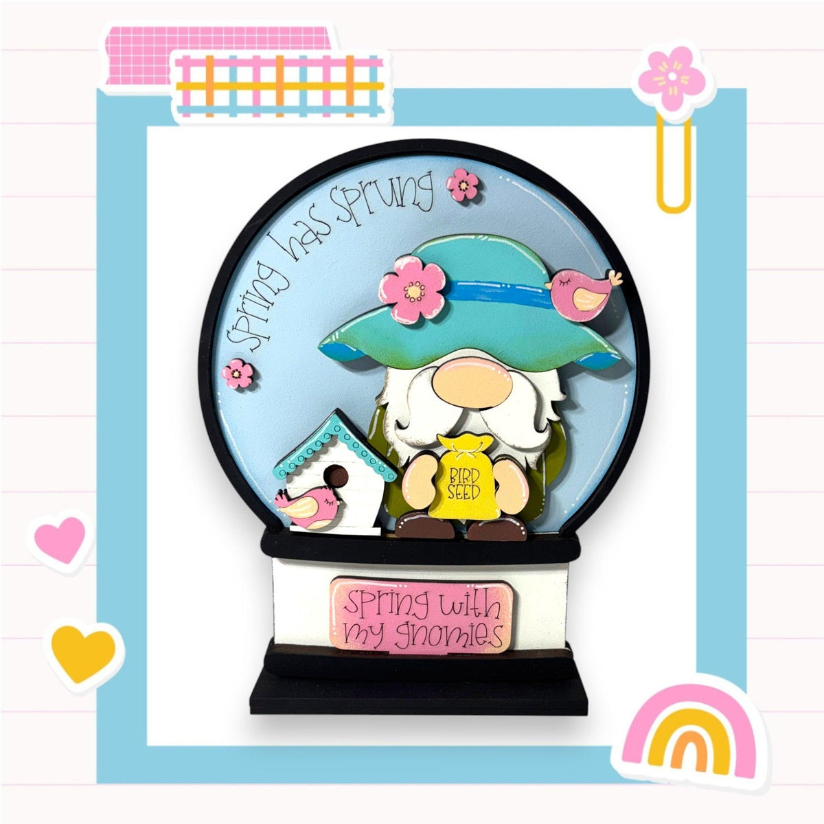 a small clock with a picture of a girl inside of it