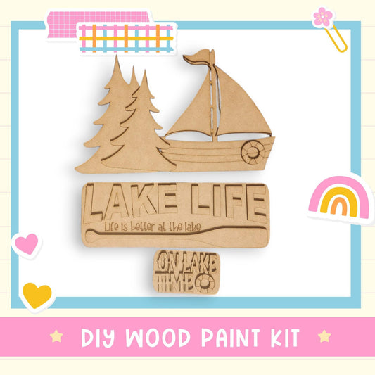 a wooden cutout of a boat with a rainbow in the background