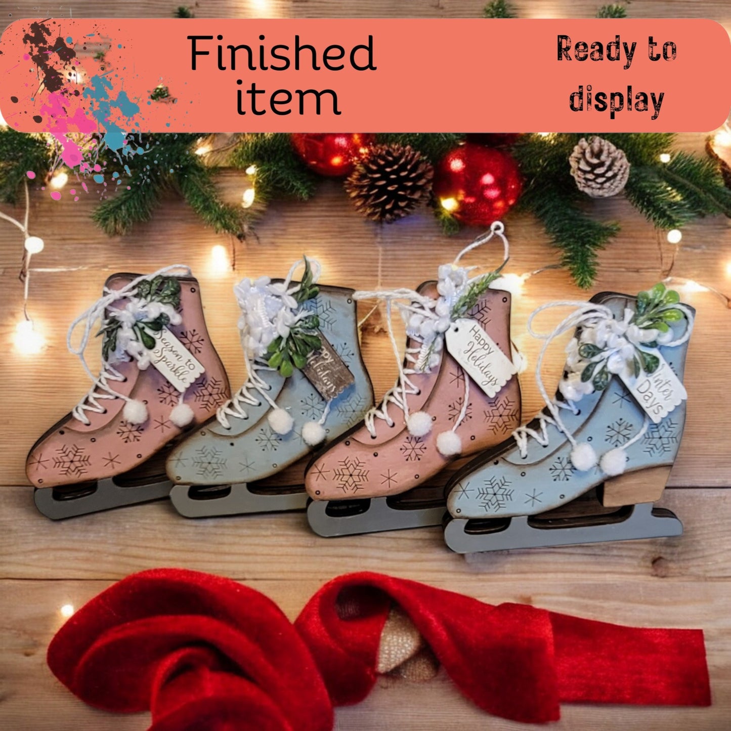 a row of ice skates sitting on top of a wooden floor