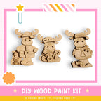 three wooden toy animals, likely moose or reindeer, posed in a playful manner. The text below the image suggests that it is a DIY wood paint kit, and if the viewer can create it, they can make it.