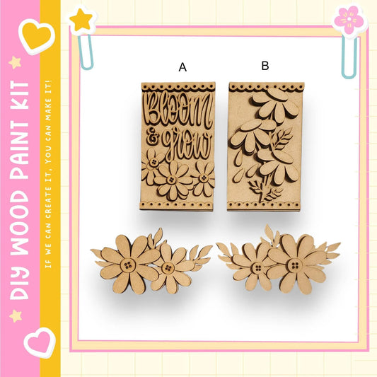 two wooden cutouts of flowers and leaves, along with a pink and yellow border and decorative elements such as hearts and stars.