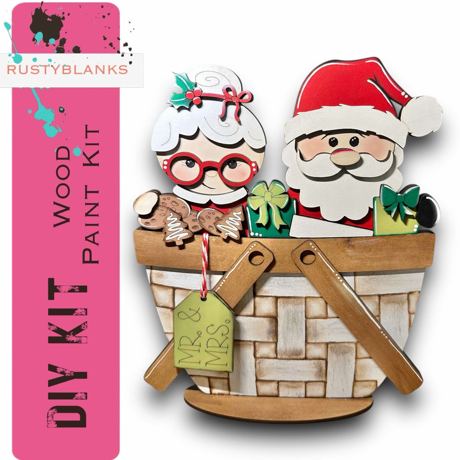 a christmas ornament with santa and mrs claus in a basket