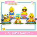 a group of rubber ducks sitting next to each other