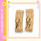 two wooden turkey-shaped cutouts with the word "GOBBLE" written on them.