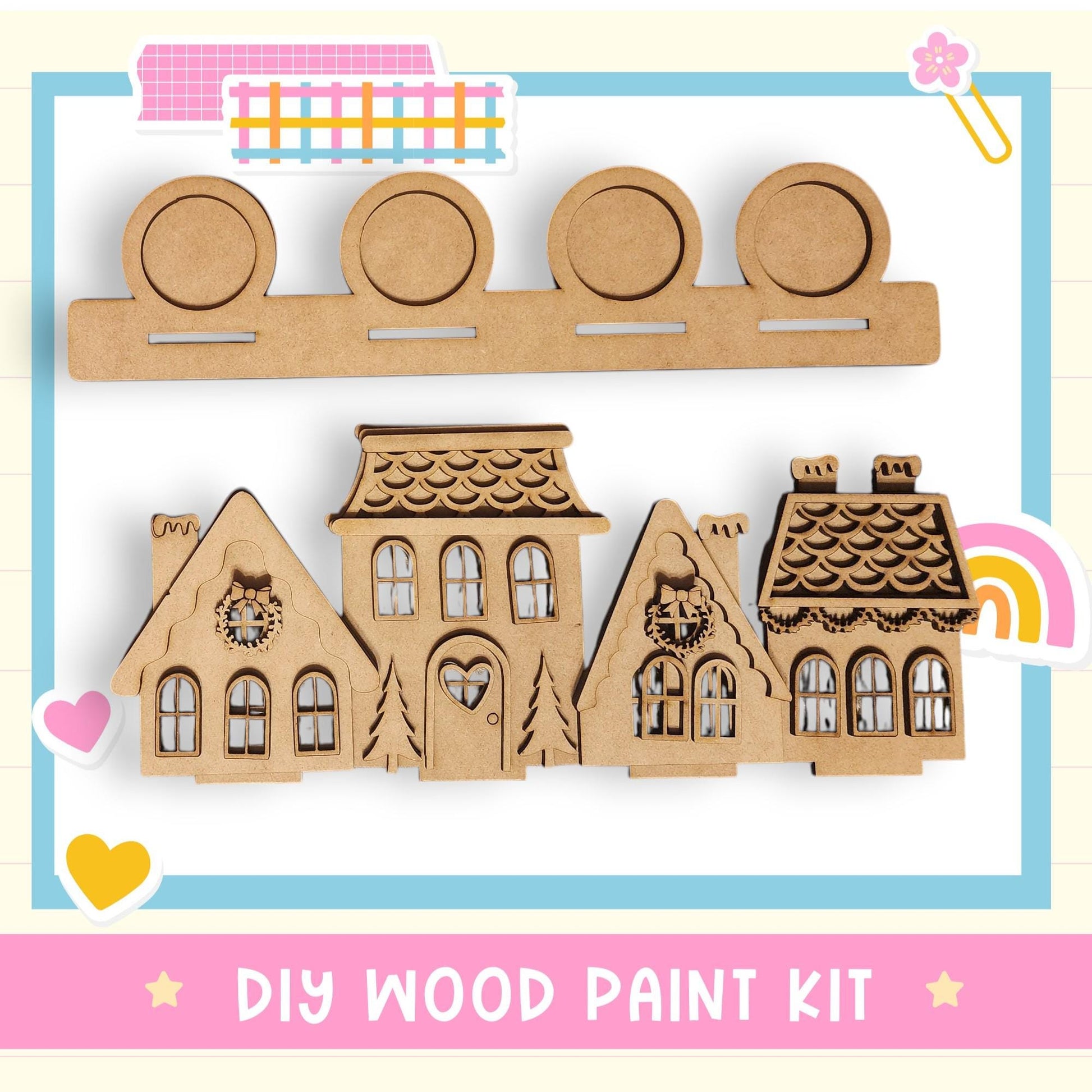 a DIY wood paint kit, including a wooden house and a wooden house cutout, along with some decorative elements such as hearts and a rainbow.