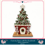 A Christmas tree-shaped object with a wreath and other decorations, placed on a wooden base. The object appears to be a DIY kit for creating a rustic farmhouse-style Christmas tree.