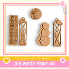 a DIY wood paint kit, including various wooden shapes and designs such as pumpkins, lanterns, and a sign.
