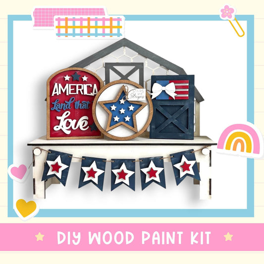 a diy wood paint kit with a barn and stars