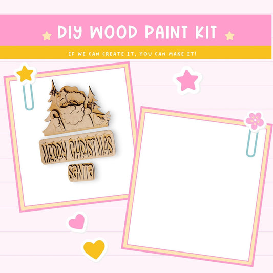 The image is a DIY wood paint kit with a pink background and a message encouraging creativity. It features a wooden Santa Claus figure and a blank white frame, along with decorative elements such as hearts and stars.