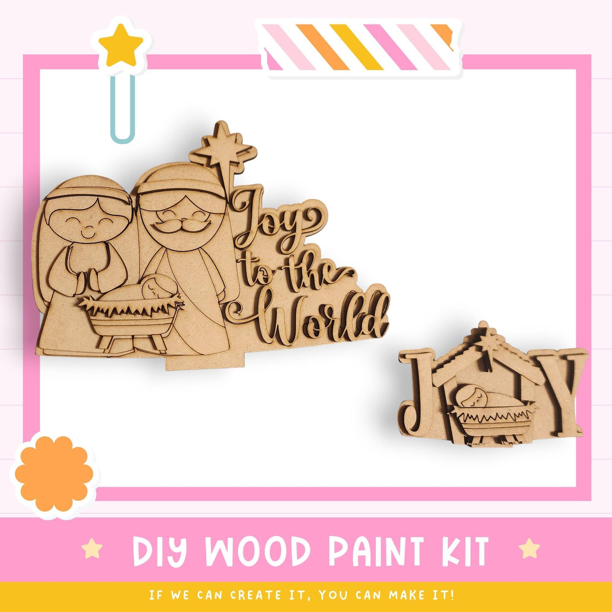 The image is a promotional poster for a DIY wood paint kit, featuring a nativity scene with a baby Jesus and the words "Joy to the World" written on a wooden ornament.