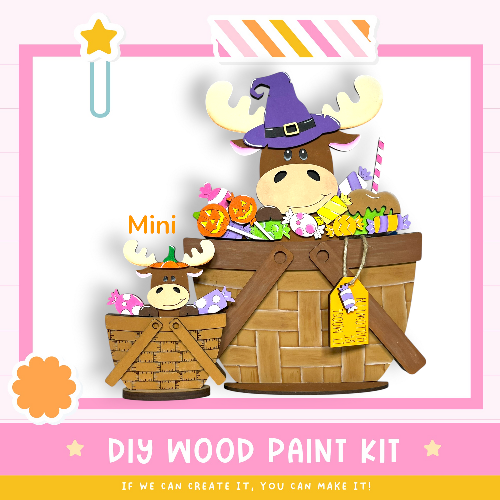 a DIY wood paint kit with a moose and a smaller moose inside a basket, surrounded by various Halloween-themed items.