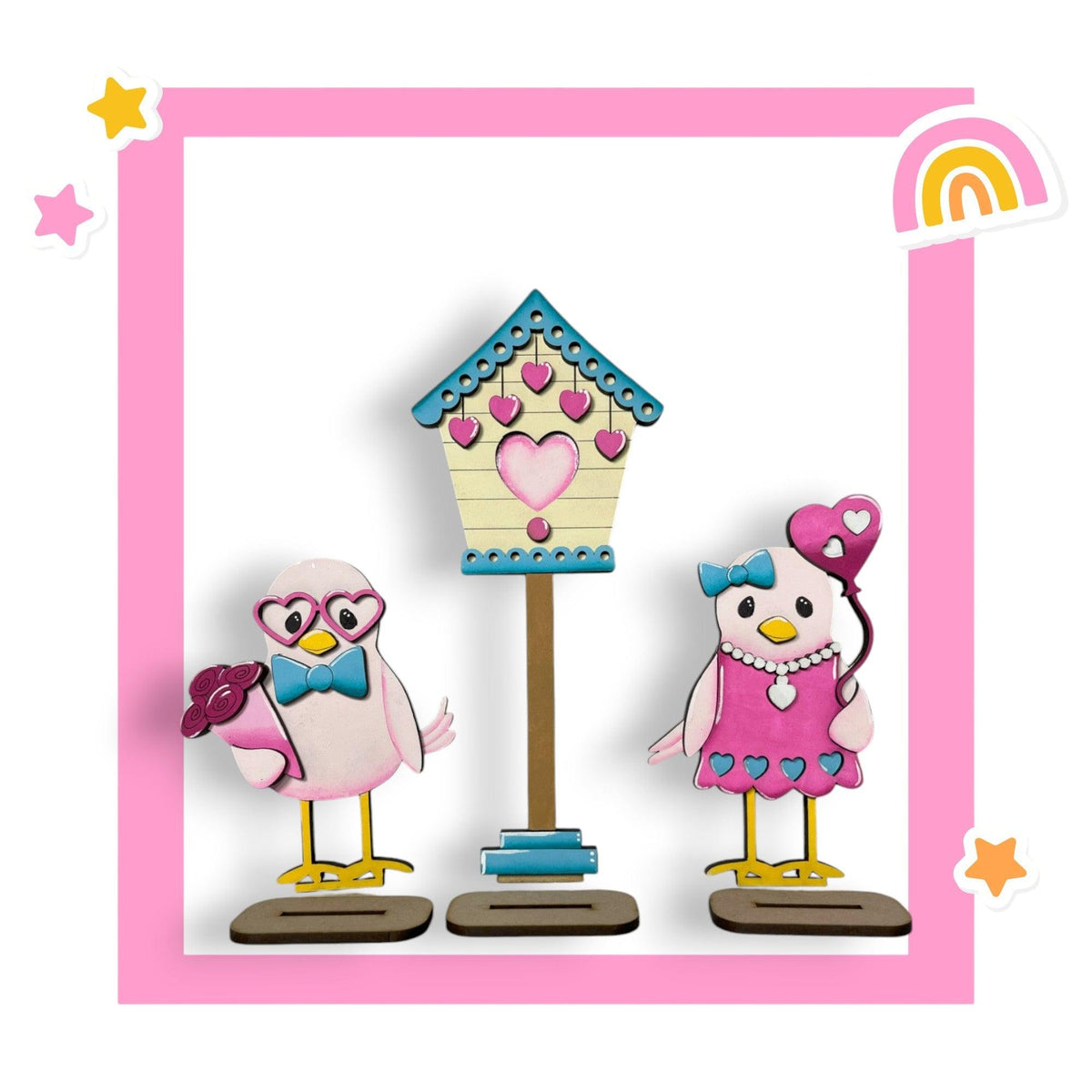 a couple of birds standing next to a bird house