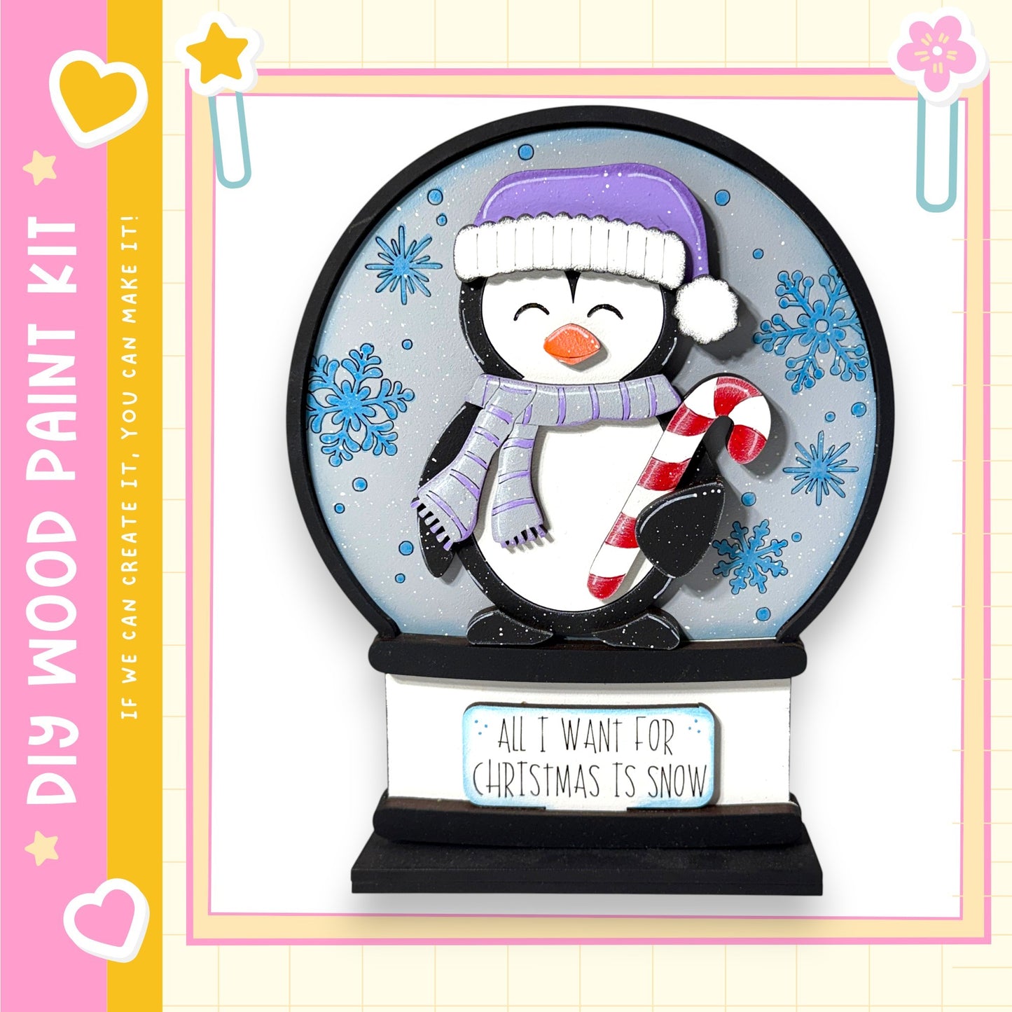 A snow globe with a penguin wearing a purple hat and scarf, holding a candy cane, and surrounded by snowflakes.