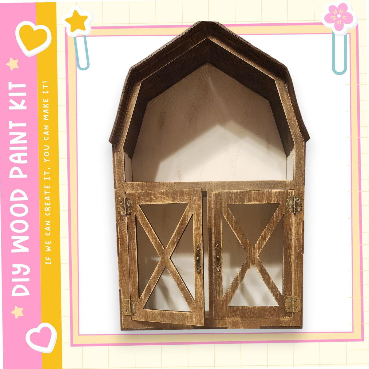 a wooden barn-like structure with a curved roof and two open wooden doors, set against a pink and yellow background with a heart and star motif.