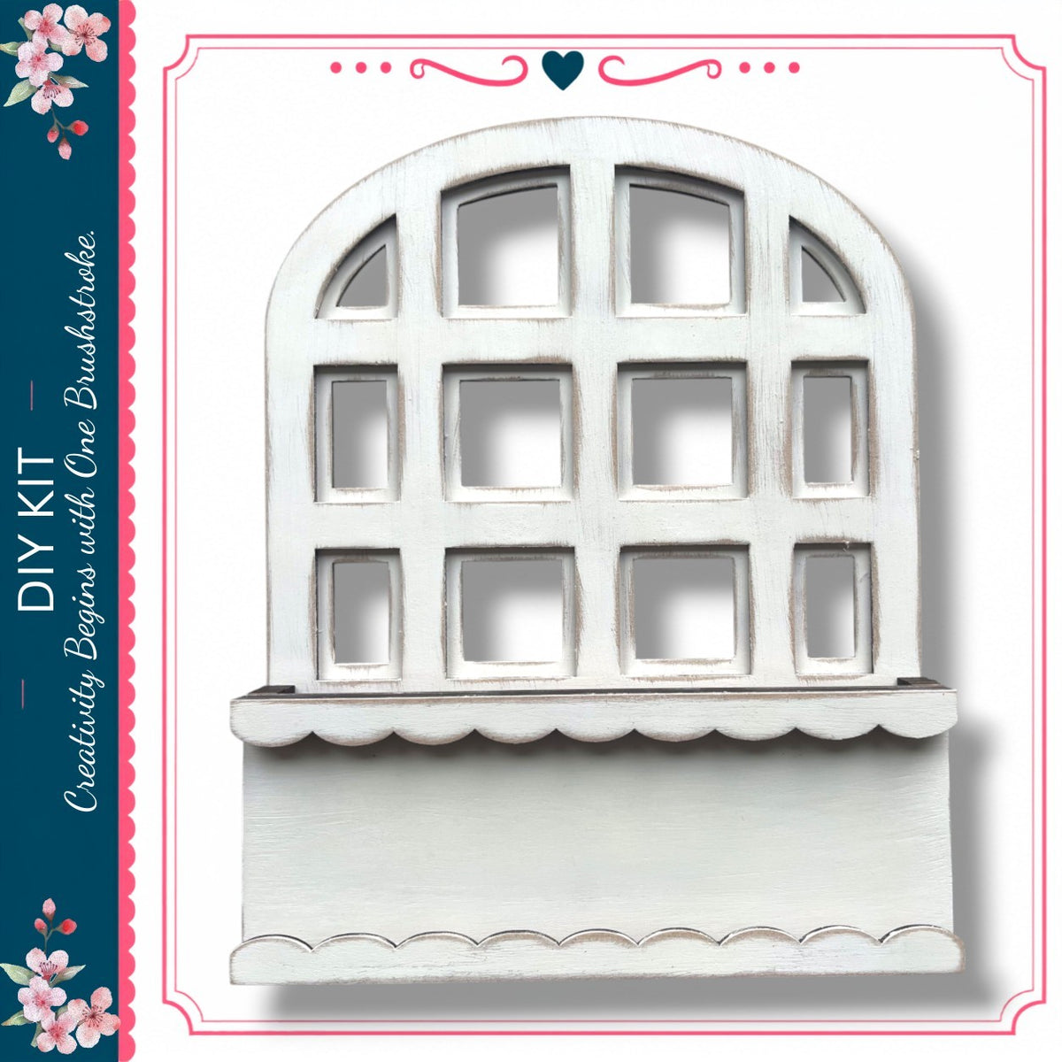 a white wooden window with a scalloped trim, set against a white background.