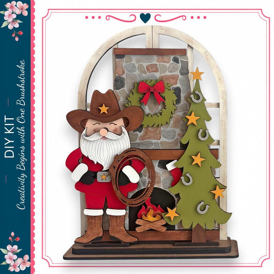 A wooden Santa Claus figure holding a lasso stands in front of a Christmas tree and wreath, with a brick fireplace and a wreath above the fireplace.