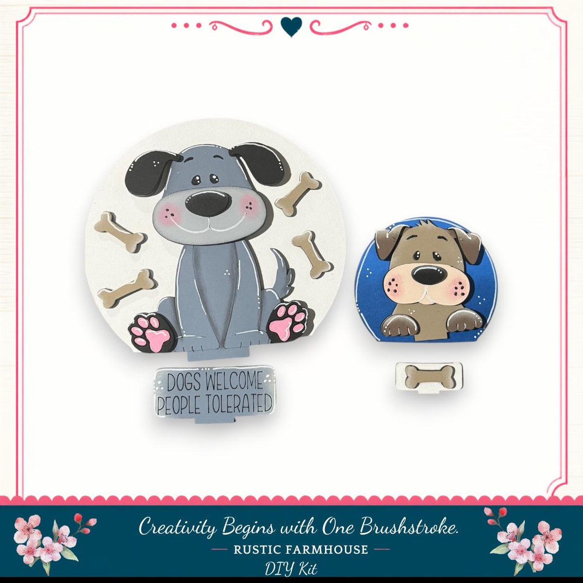 two cartoon dog illustrations, one larger and one smaller, surrounded by dog bones. The larger dog is sitting on a sign that says "Dogs Welcome People Tolerated", and the smaller dog is peeking out from behind a blue frame. The image is described as a "DIY Kit" and "Creativity Begins with One Brushstroke" from a "RUSTIC FARMHOUSE".
