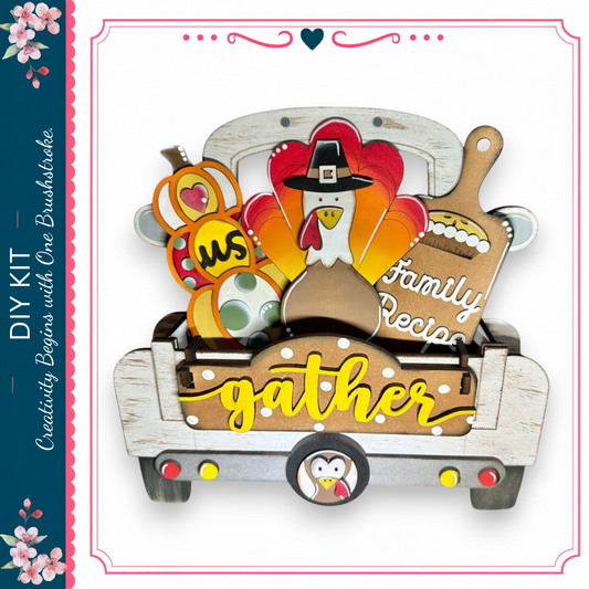 A wooden truck bed decorated with a Thanksgiving-themed cutout, including a turkey, pumpkin, and a sign that says "Family Recipes".