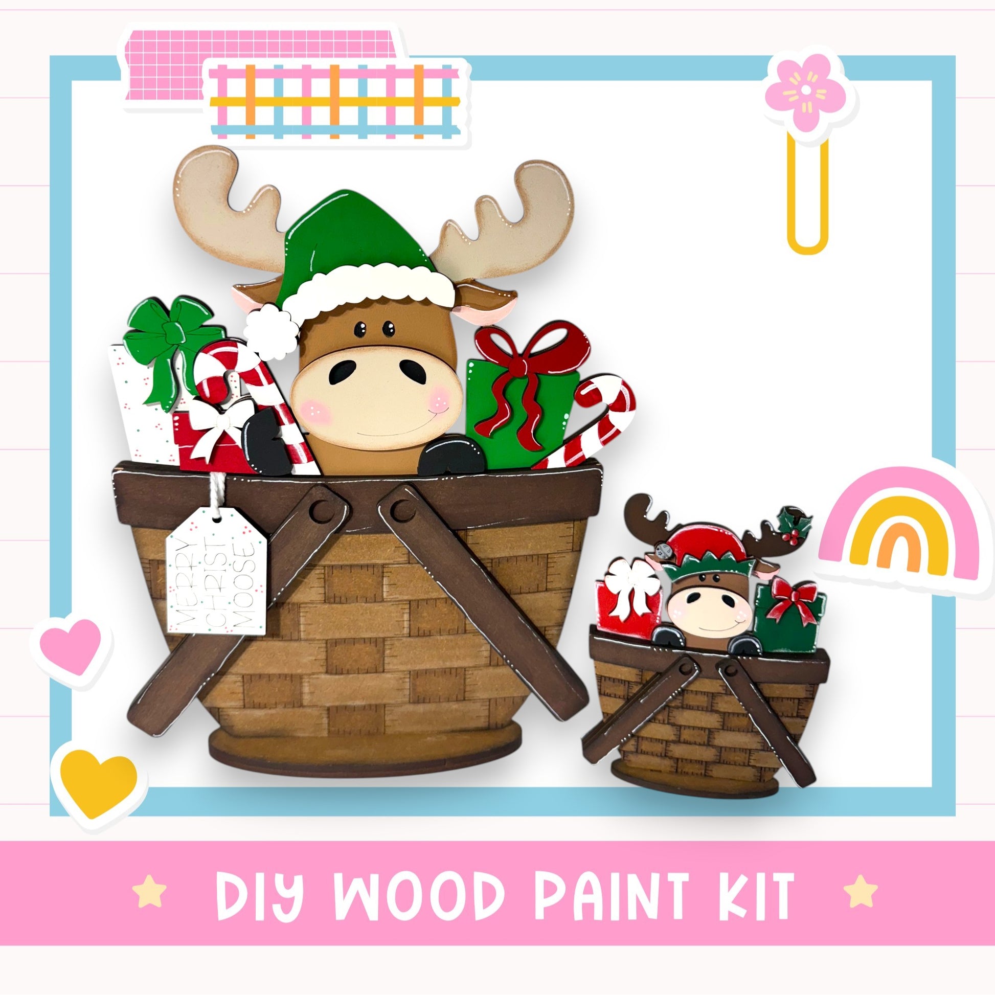 A wooden paint kit featuring a moose and a smaller moose in a basket, surrounded by various holiday-themed items such as presents and a bow.