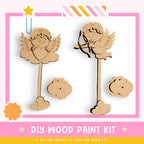 a DIY wood paint kit with two wooden cherubs and clouds, along with a star and a flower. The kit appears to be made of wood and is designed for painting.
