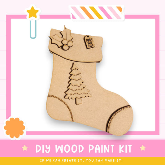 a DIY wood paint kit for creating a wooden stocking, with a picture of a wooden stocking and a tag that says "Santa's Gift".