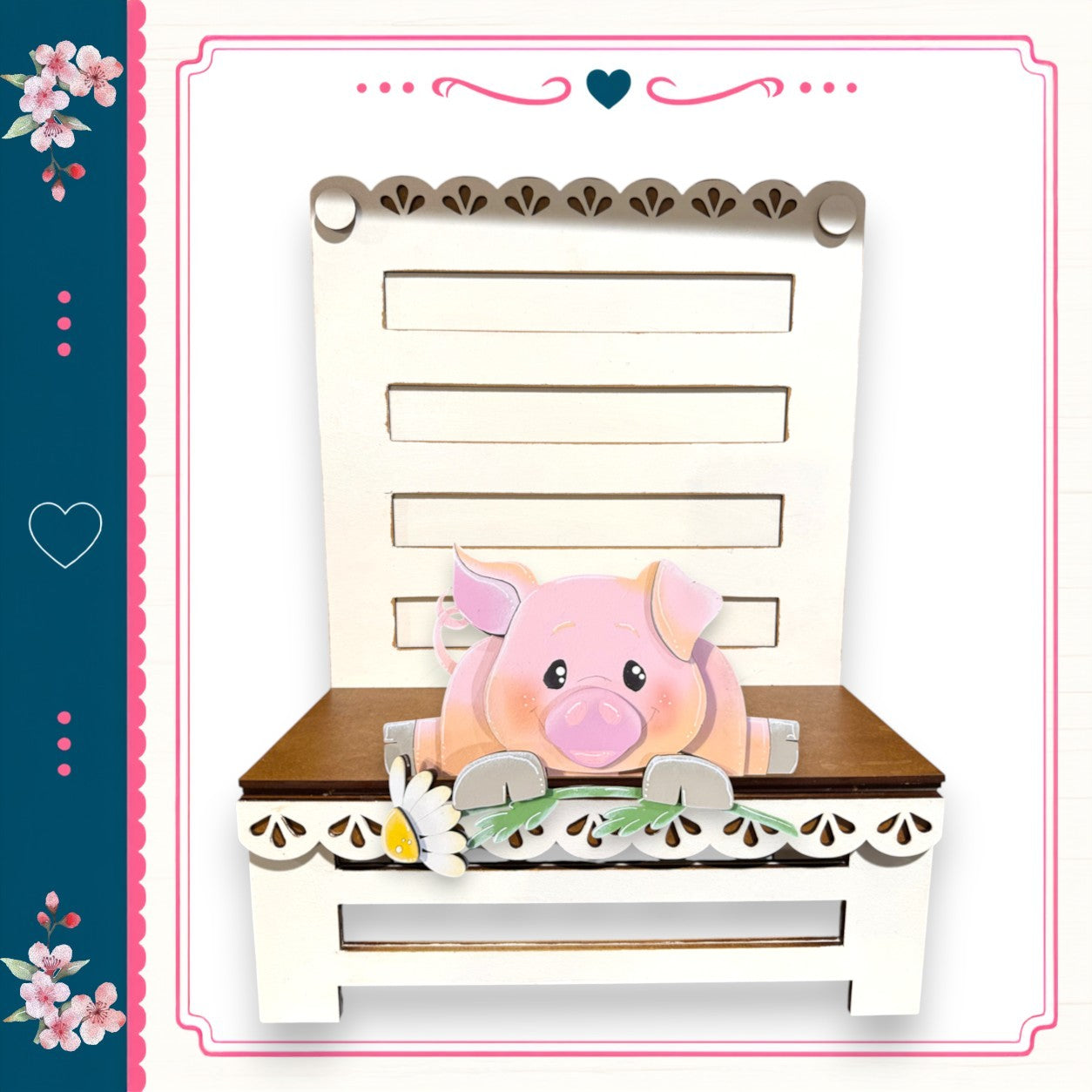 A pink pig sitting on a wooden bench with a flower on the bench.