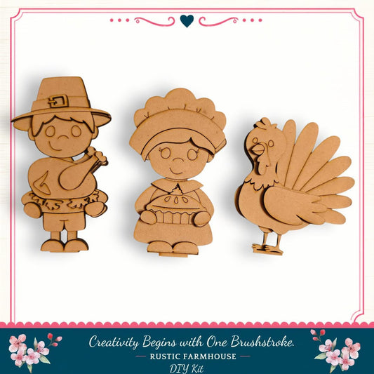 three wooden cutouts of a boy, a girl, and a turkey, arranged in a row.
