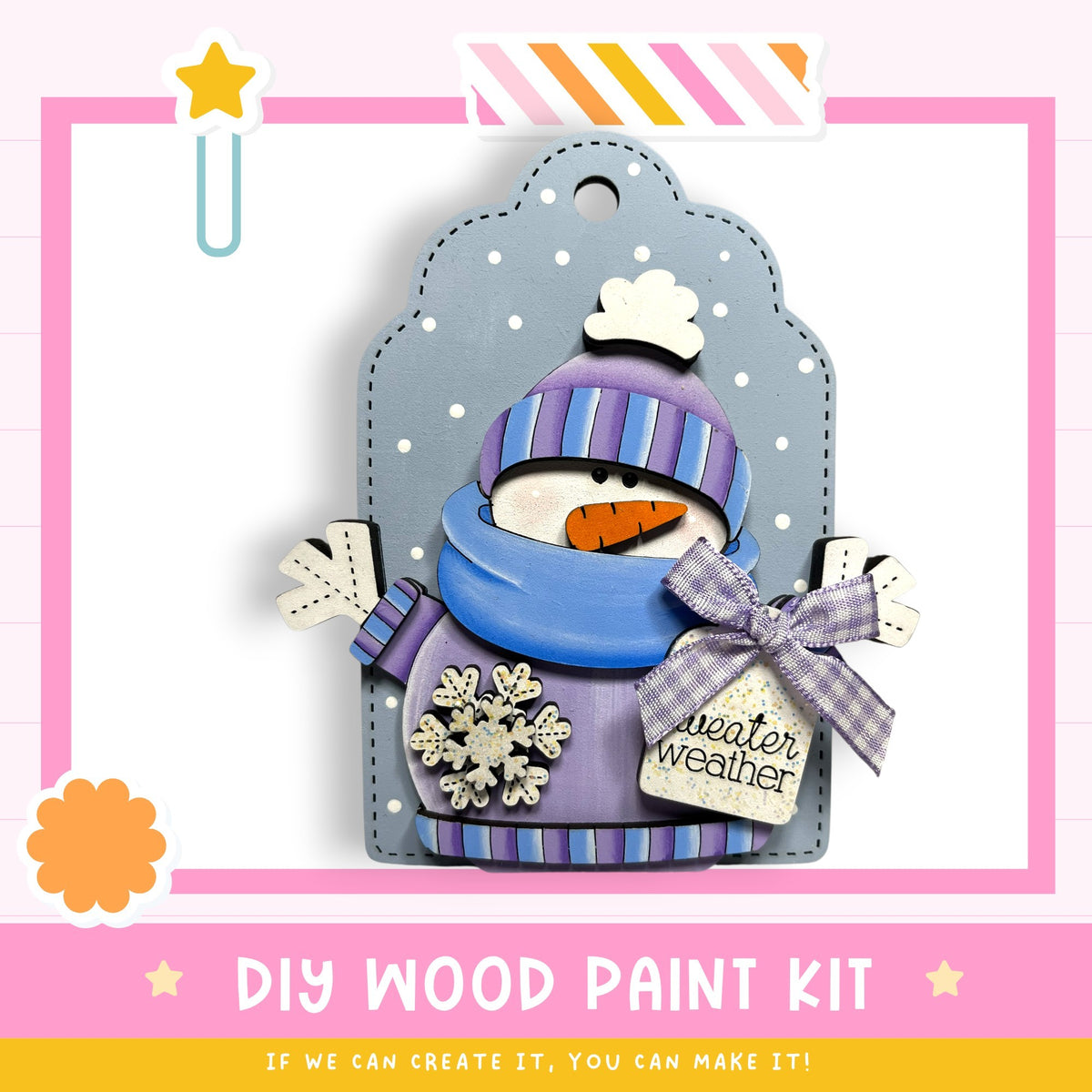 a DIY wood paint kit for creating a winter-themed wooden ornament. The kit includes a snowman figure and a tag that says "Winter weather". The kit is presented in a pink and white frame, and the text "DIY WOOD PAINT KIT" is displayed at the bottom.