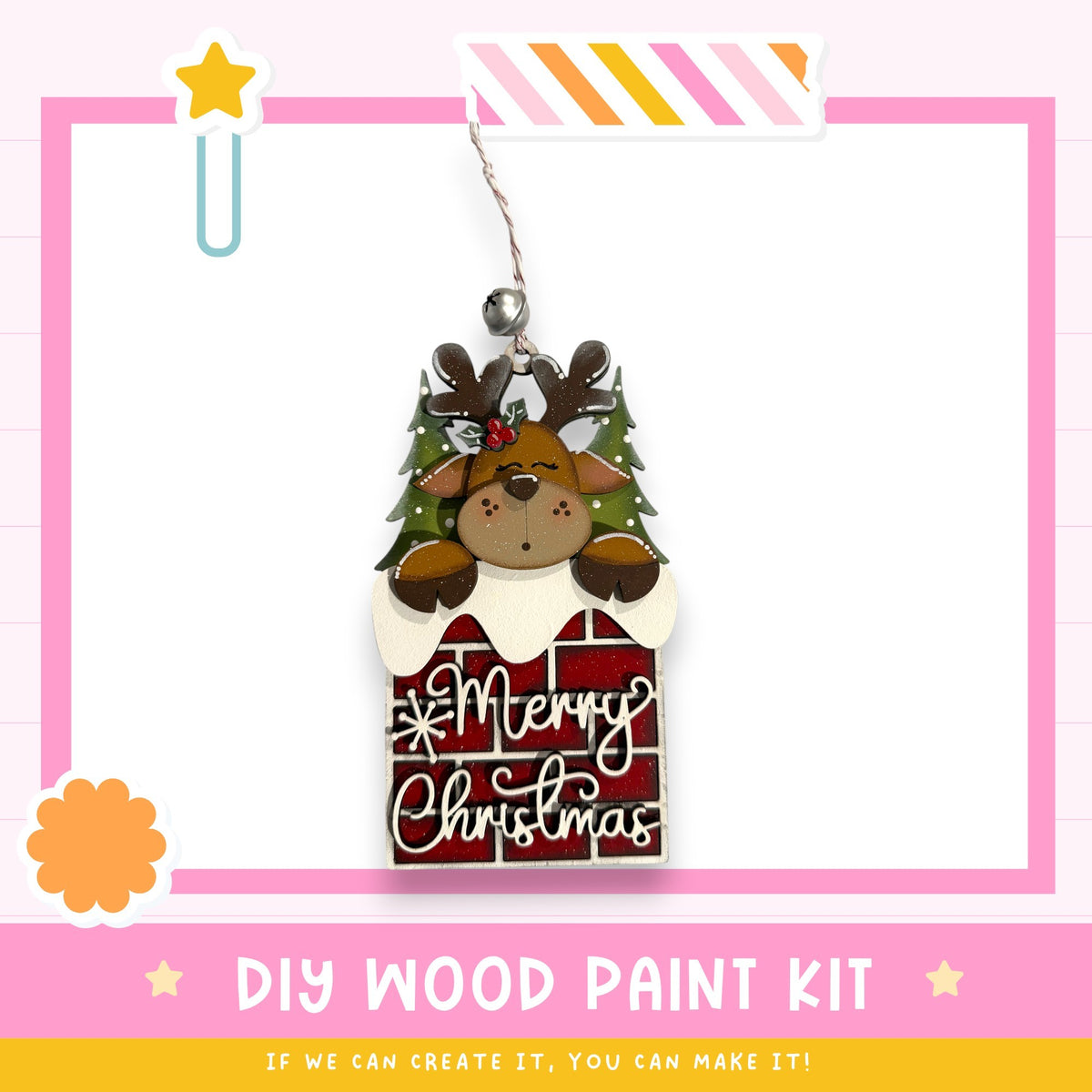 A DIY wood paint kit for creating ornaments, with a festive Christmas theme featuring a reindeer and a brick wall with a "Merry Christmas" message.