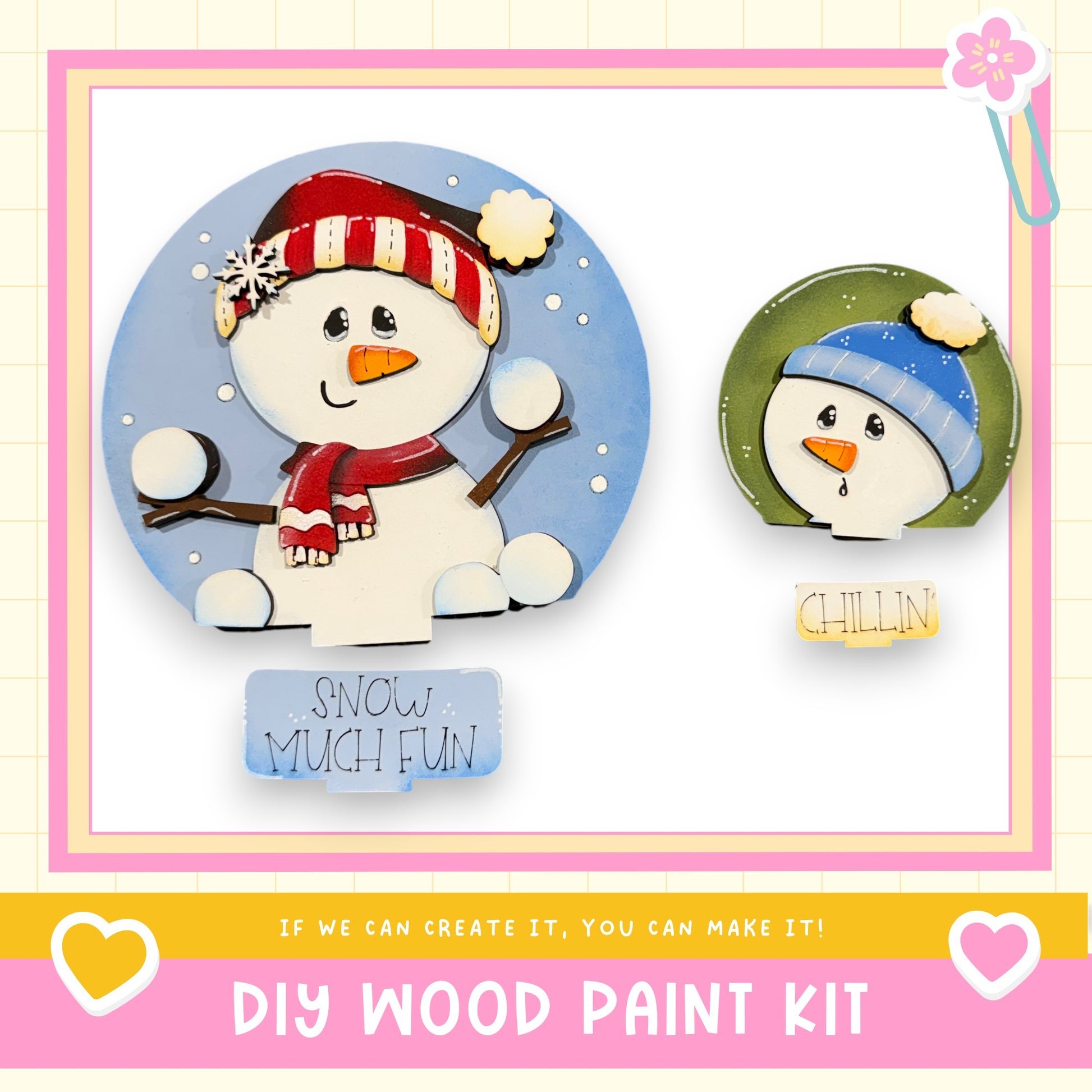 two snowman decorations, one larger and one smaller, both wearing winter hats and scarves. The larger snowman is wearing a red and white striped hat and a red scarf, while the smaller snowman is wearing a blue hat and a green scarf. The image also includes text that says "If we can create it, you can make it!" and "DIY WOOD PAINT KIT", suggesting that these snowman decorations can be easily created using a DIY wood paint kit.