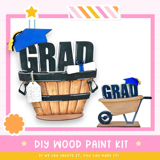 a DIY wood paint kit for creating a wooden basket or cart with the word "GRAD" written on it. The kit includes a wooden basket, a wooden cart, and a wooden tag with the word "GRAD" written on it. The kit is presented in a pink and white frame, and the text "DIY WOOD PAINT KIT" is displayed at the bottom.