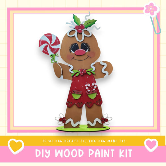 a picture of a ginger holding a lollipop