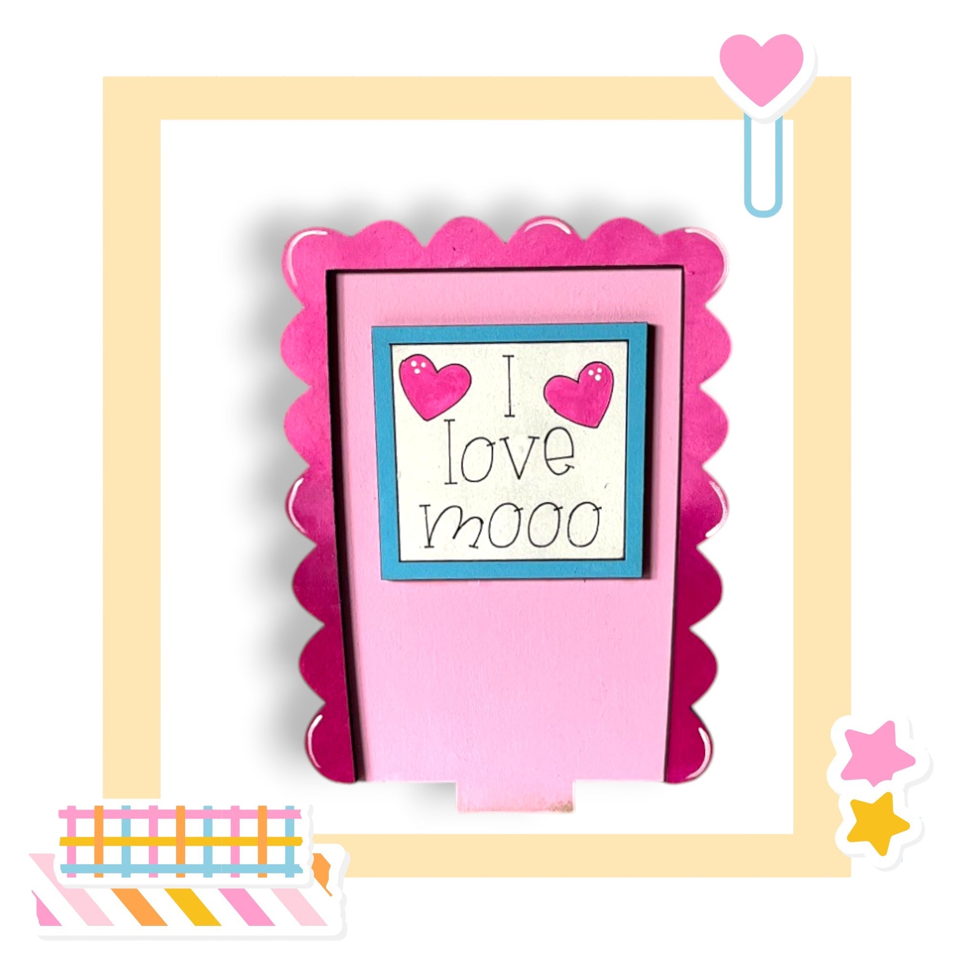 a picture frame with a picture of two hearts on it