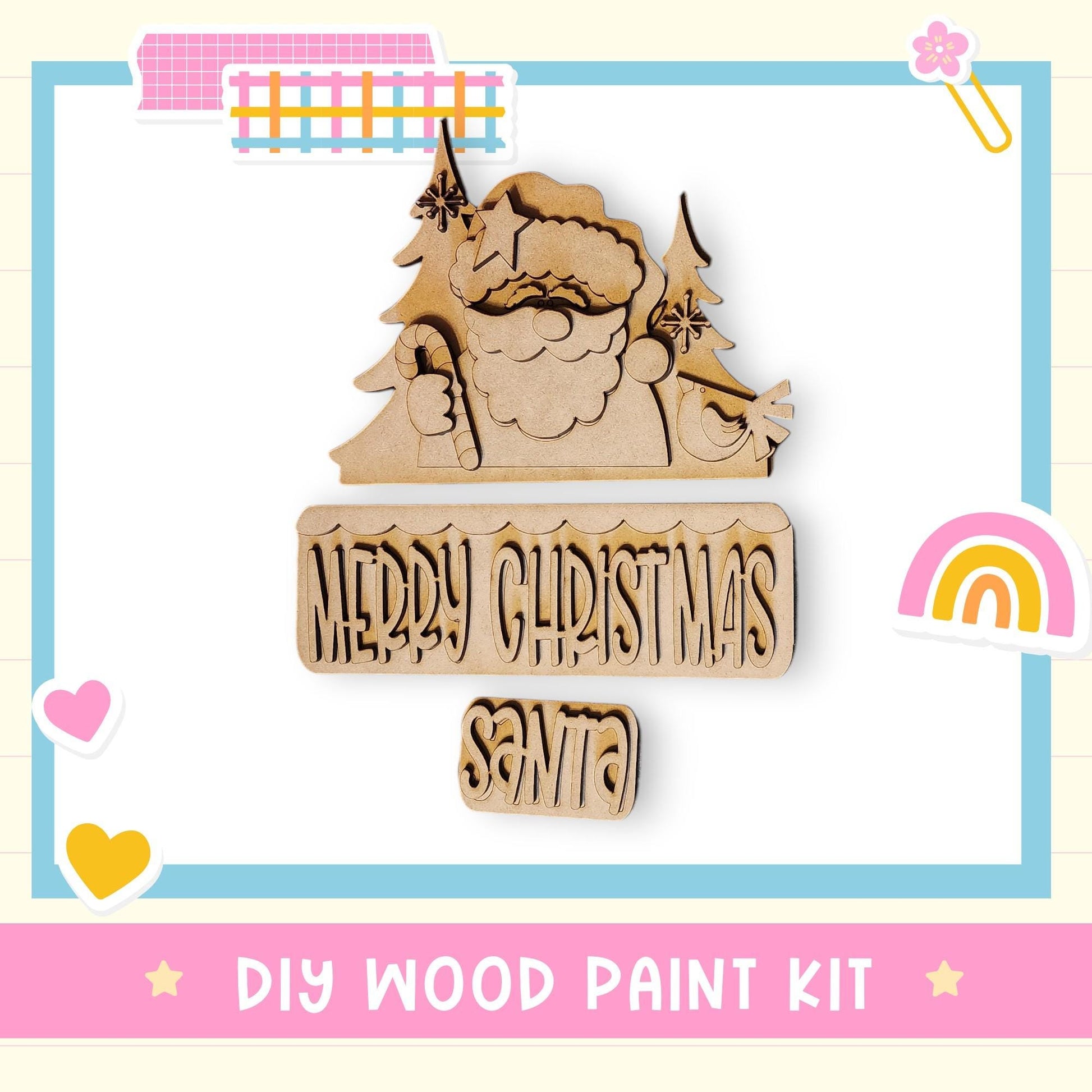 The image is a DIY wood paint kit for creating a Christmas-themed decoration, featuring a wooden Santa Claus figure and the text "Merry Christmas Santa".