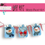 a snowman and a snowman are hanging from a string