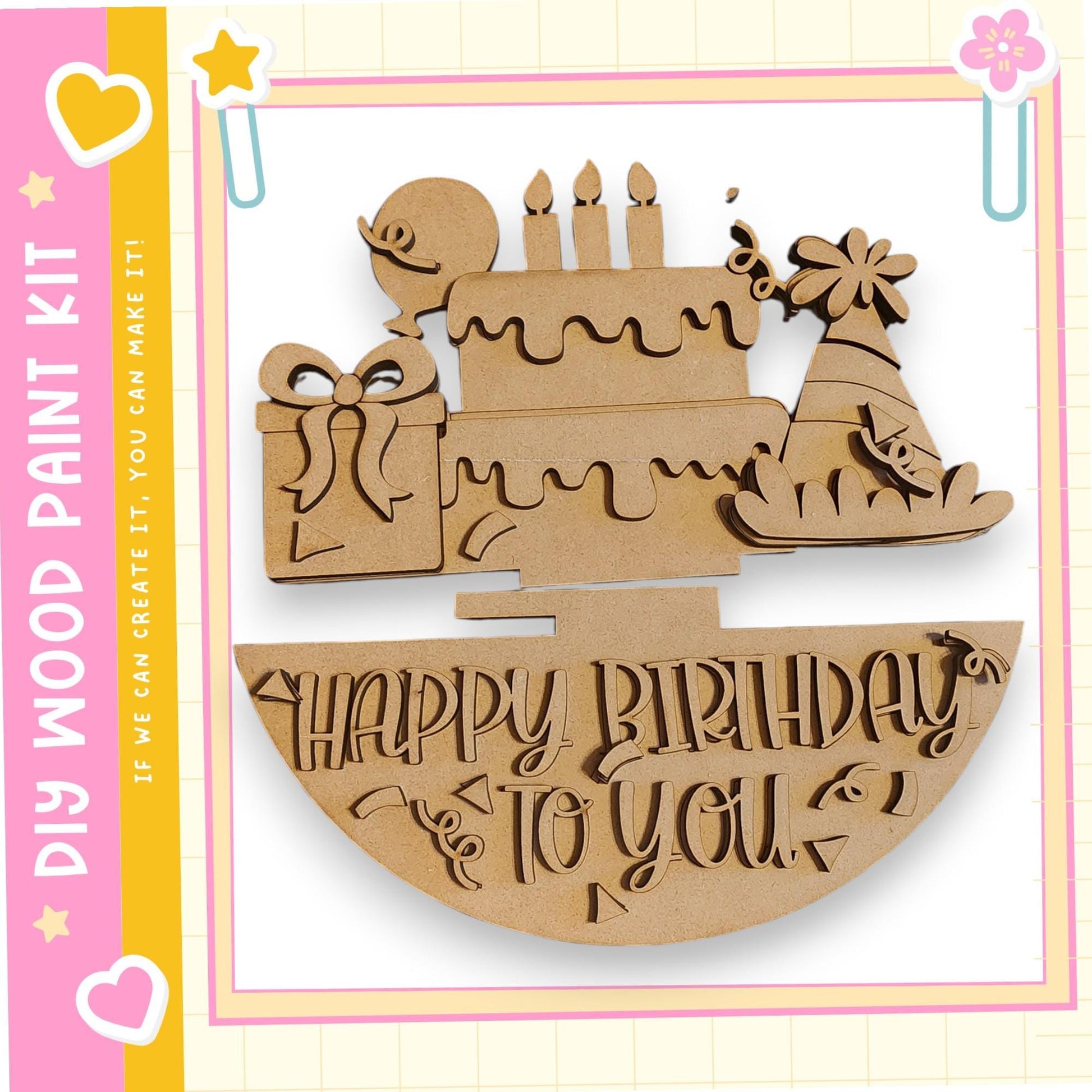 A wooden birthday cake with candles and decorations, along with the text "Happy Birthday to you" carved into it.